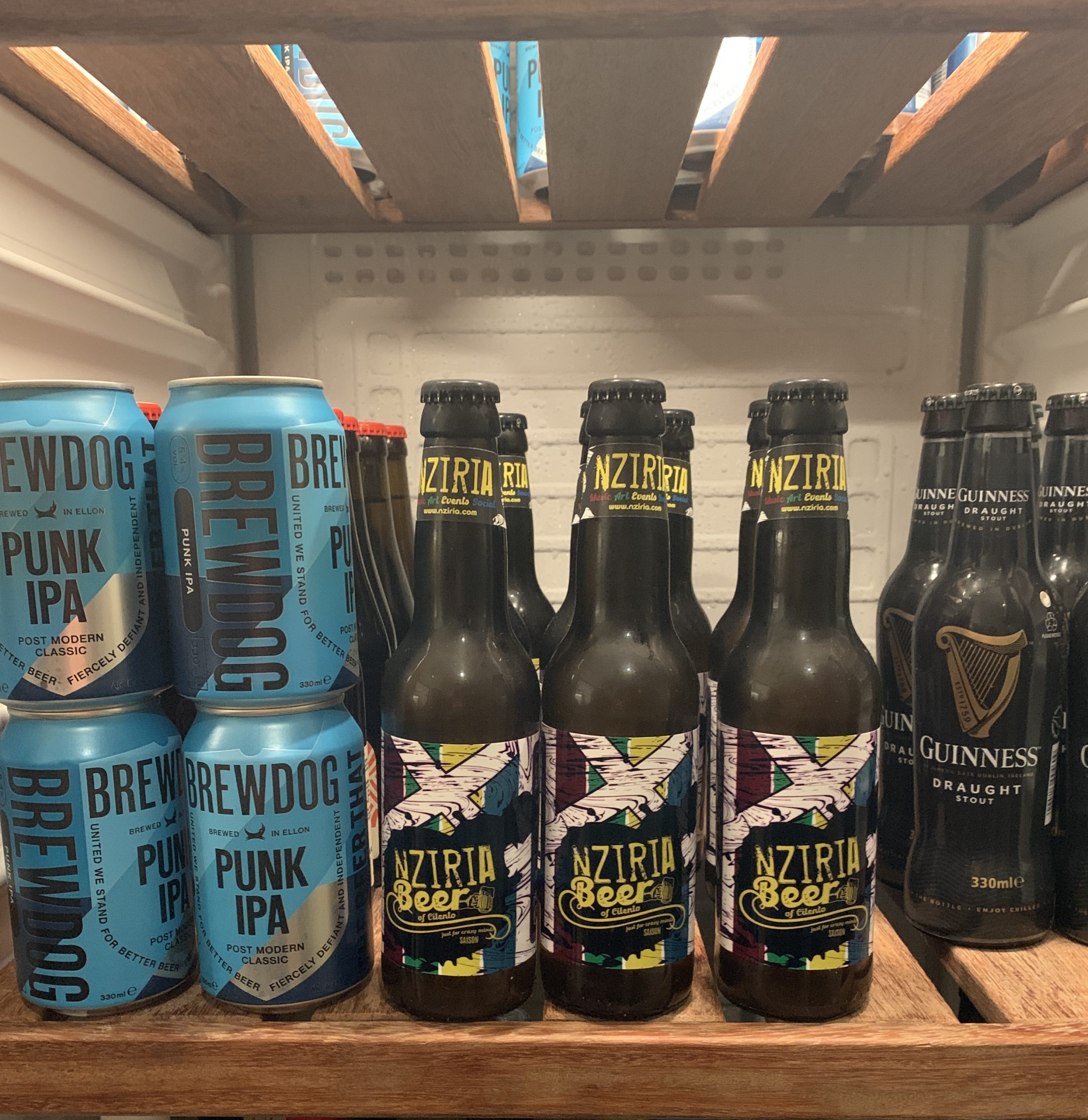 NZIRIA BEER with brew dog and Guinness display at Cantina cicerenella Bracigliano